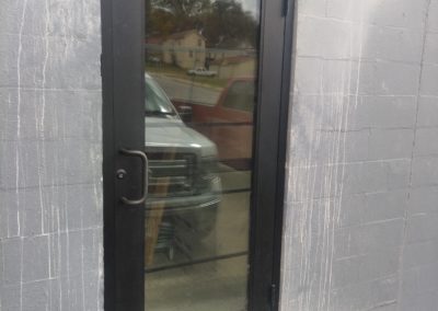 Black door with glass installed by MAC in Kansas City