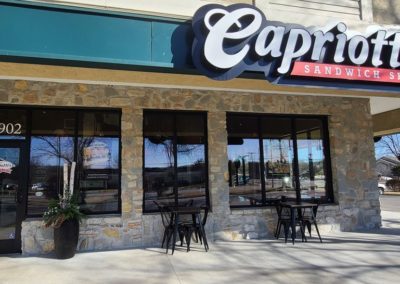 Capriotti's Sandwich Shop stone and glass front designed by MAC in Kansas City