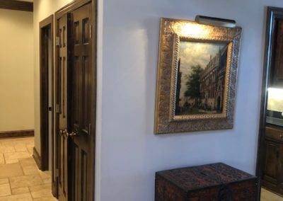 Tiled floor and custom wood doors and trim by MAC in Kansas City