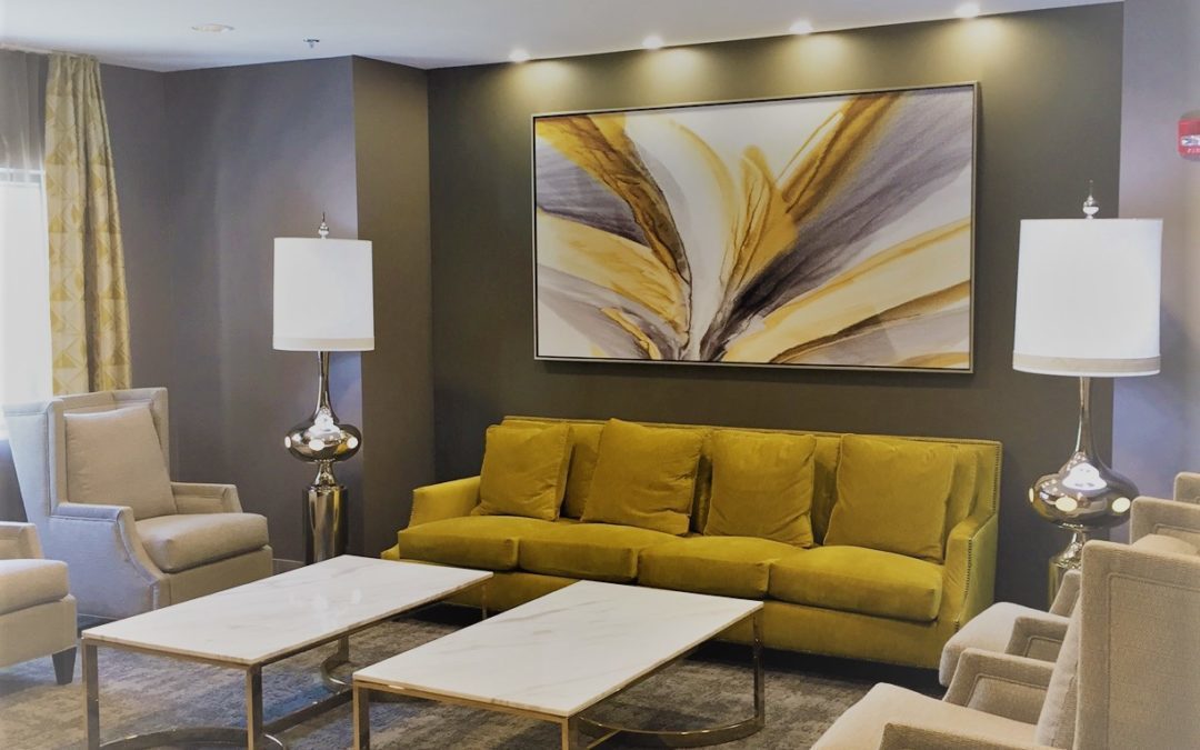Gray room with white and yellow furniture and carpet installed and designed by MAC in Kansas City